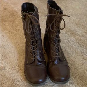 Women’s dark brown leather combat boots by Guess